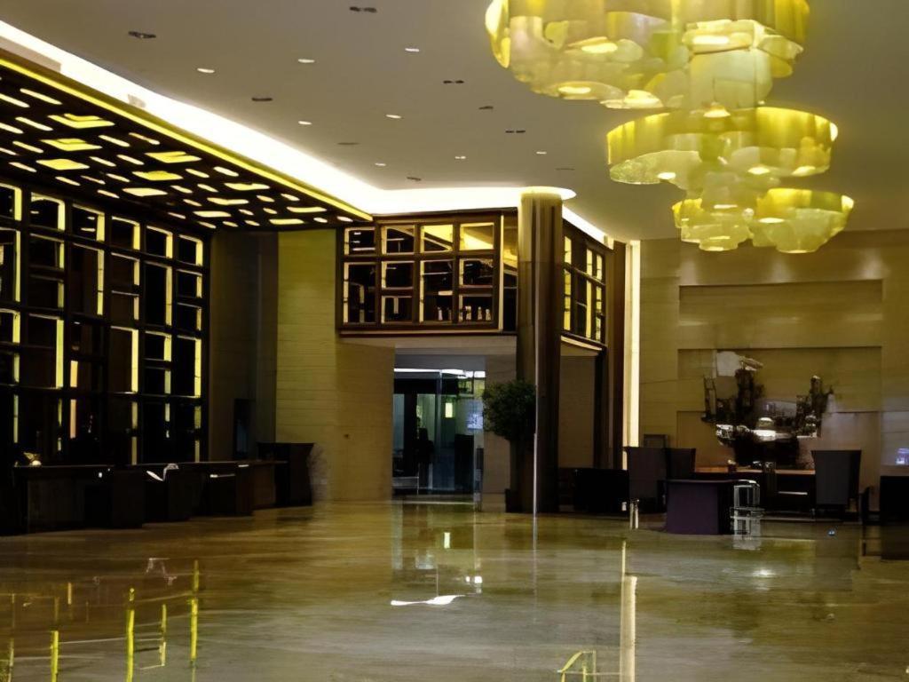 Zhangjiagang Jiangnan Garden Hotel Bagian luar foto