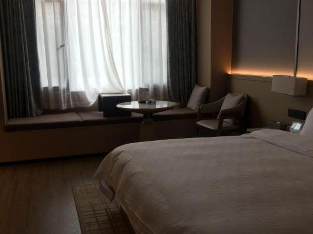 Zhangjiagang Jiangnan Garden Hotel Bagian luar foto