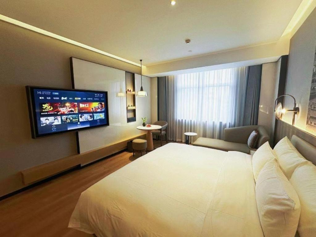 Zhangjiagang Jiangnan Garden Hotel Bagian luar foto