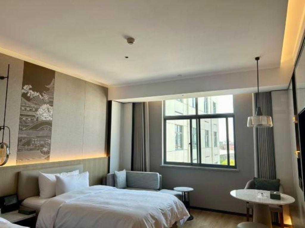 Zhangjiagang Jiangnan Garden Hotel Bagian luar foto