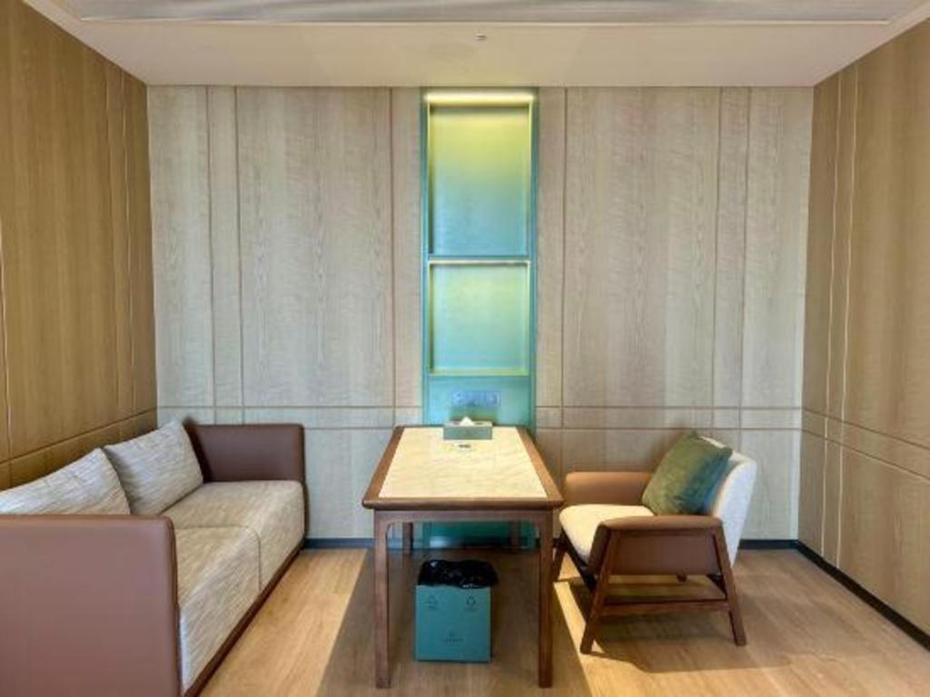 Zhangjiagang Jiangnan Garden Hotel Bagian luar foto