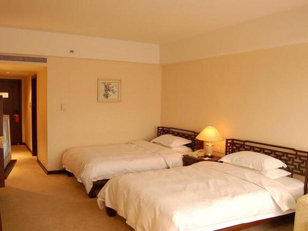 Zhangjiagang Jiangnan Garden Hotel Bagian luar foto